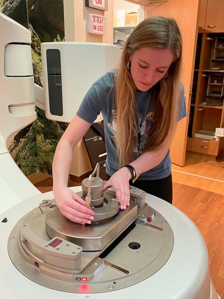 Dr. Breeze works on metal machine